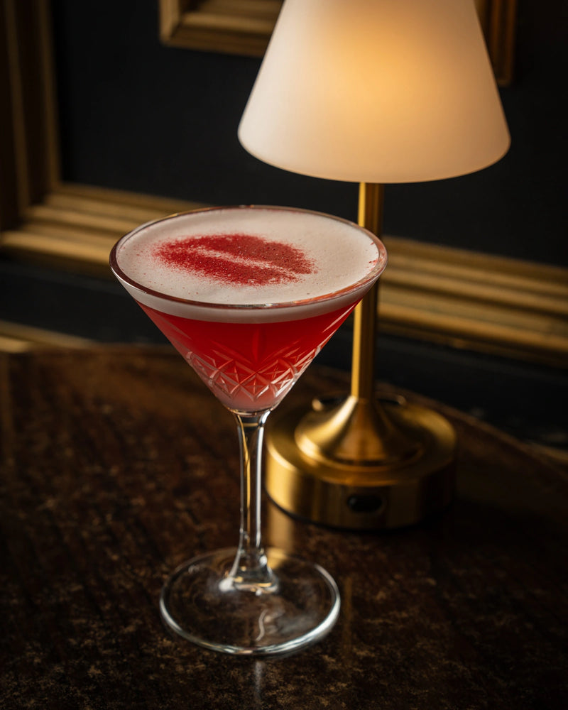 Red martini cocktail with foam top at LOSH Bar & Grill, Harpenden
