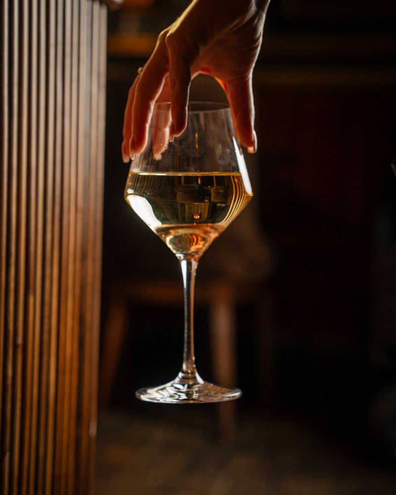 Glass of white wine served at LOSH Bar & Grill, Harpenden